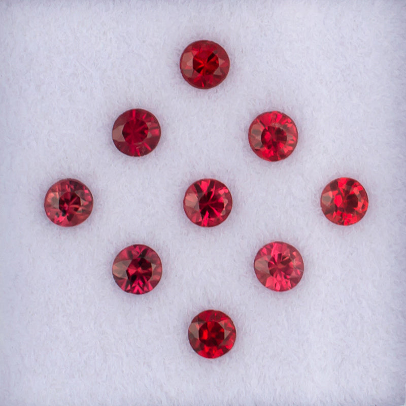 0.83twt Orange Sapphire Colored Gemstone Melee Parcel Top View White Background
