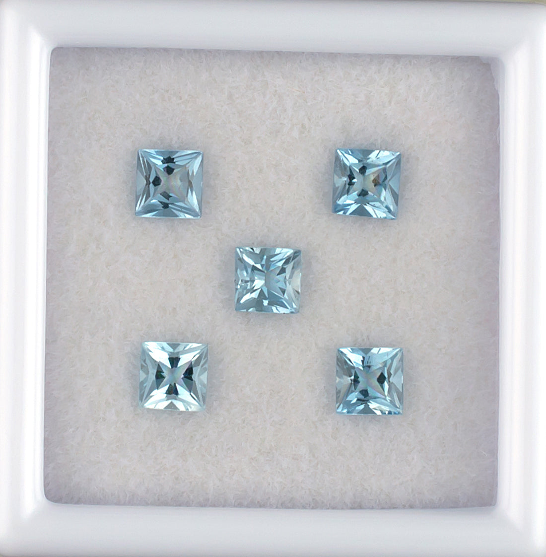0.84twt Aquamarine Colored Gemstone Melee Parcel Top View White Background
