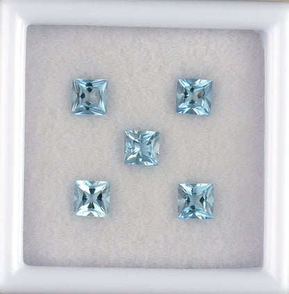 0.84twt Aquamarine Colored Gemstone Melee Parcel Top View White Background
