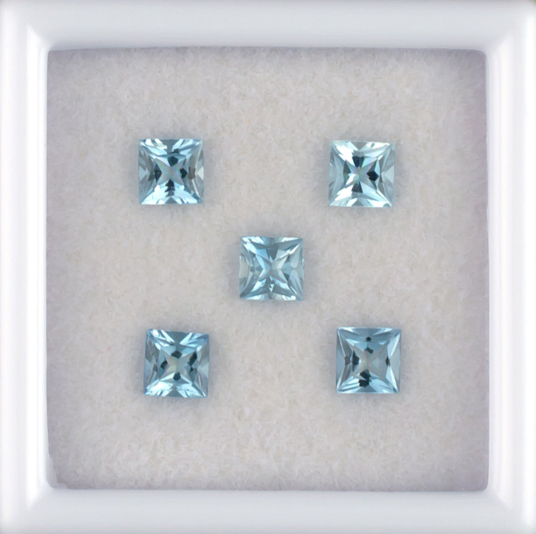 0.84twt Aquamarine Colored Gemstone Melee Parcel Top View White Background
