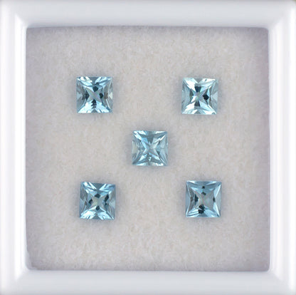 0.84twt Aquamarine Colored Gemstone Melee Parcel Top View White Background
