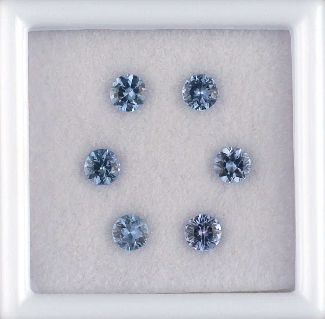 0.85twt Blue Sapphire Colored Gemstone Melee Parcel Top View White Background 
