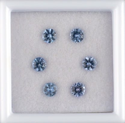 0.85twt Blue Sapphire Colored Gemstone Melee Parcel Top View White Background 
