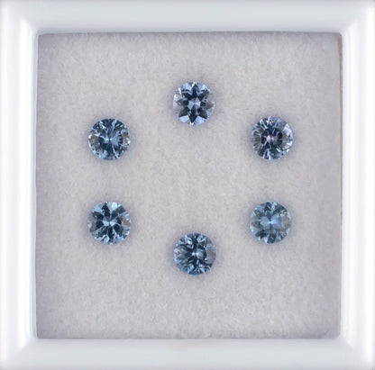 0.85twt Blue Sapphire Colored Gemstone Melee Parcel Top View White Background 
