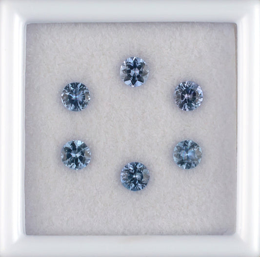 0.85twt Blue Sapphire Colored Gemstone Melee Parcel Top View White Background 

