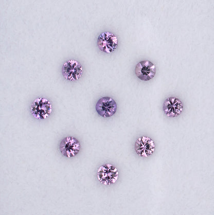 0.86twt Purple Sapphire Colored Gemstone Melee Parcel Top View White Background
