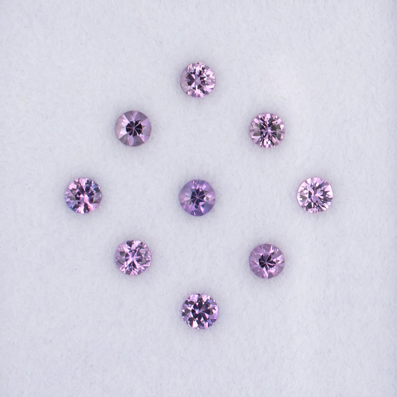 0.86twt Purple Sapphire Colored Gemstone Melee Parcel Top View White Background
