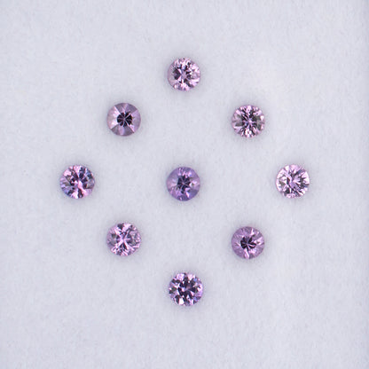 0.86twt Purple Sapphire Colored Gemstone Melee Parcel Top View White Background
