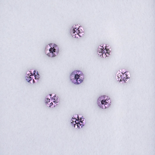 0.86twt Purple Sapphire Colored Gemstone Melee Parcel Top View White Background
