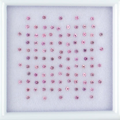 0.89twt Pink Sapphire Colored Gemstone Melee Parcel Top View White Background 
