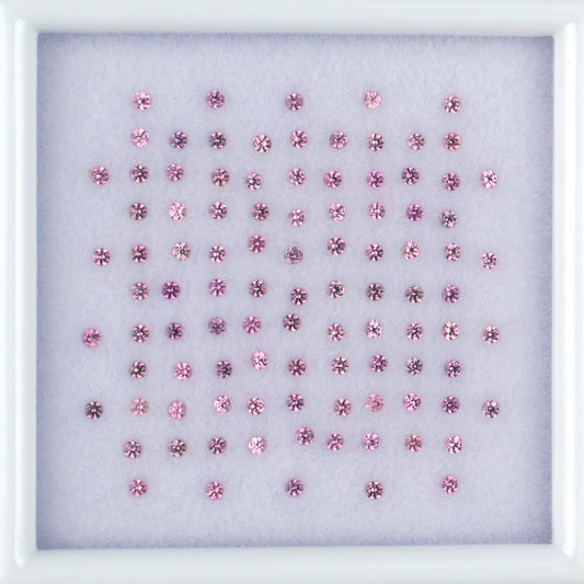 0.89twt Pink Sapphire Colored Gemstone Melee Parcel Top View White Background 
