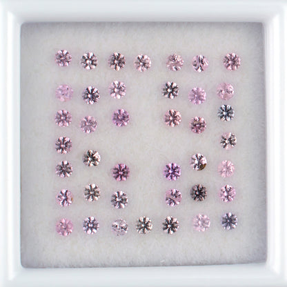 0.90twt Pink Sapphire Colored Gemstone Melee Parcel Top View White Background 
