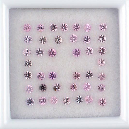 0.90twt Pink Sapphire Colored Gemstone Melee Parcel Top View White Background 
