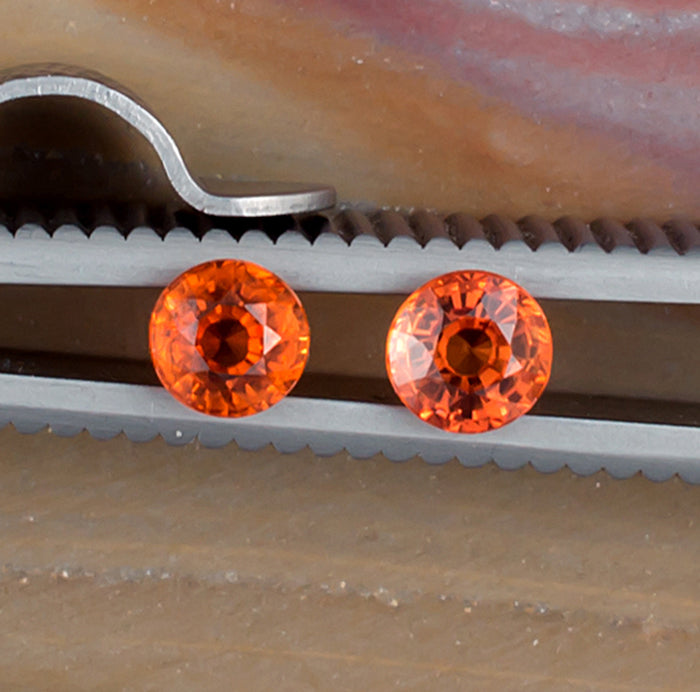 0.93twt Orange Sapphire Colored Gemstone Pair Top View Natural Background 
