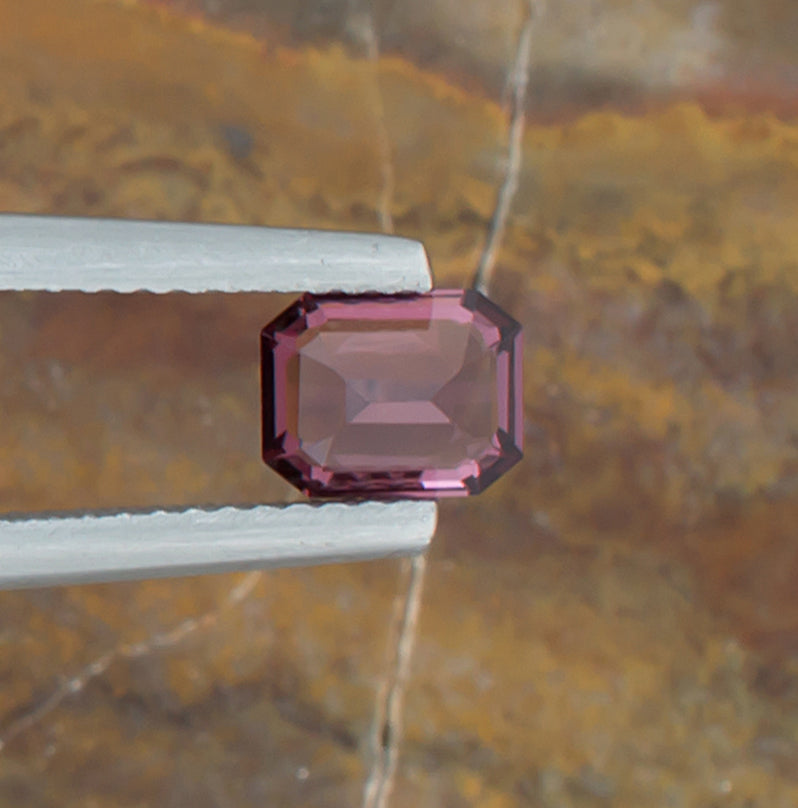0.95ct Spinel Colored Gemstone Bottom View Natural Background 