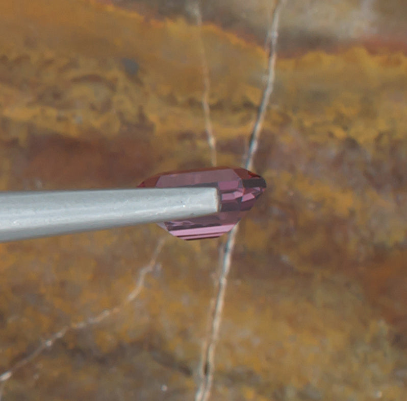 0.95ct Spinel Colored Gemstone Side View Natural Background 