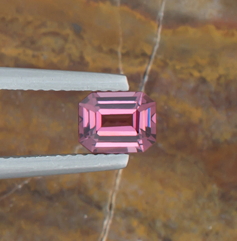 0.95ct Spinel Colored Gemstone Top View Natural Background 