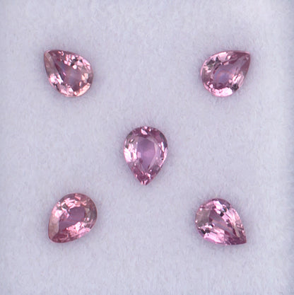 0.96twt Pink Sapphire Colored Gemstone Melee Parcel Top View White Background
