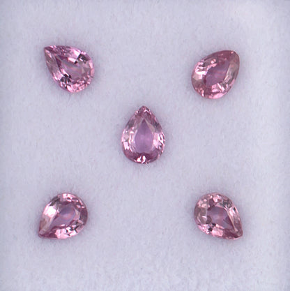 0.96twt Pink Sapphire Colored Gemstone Melee Parcel Top View White Background
