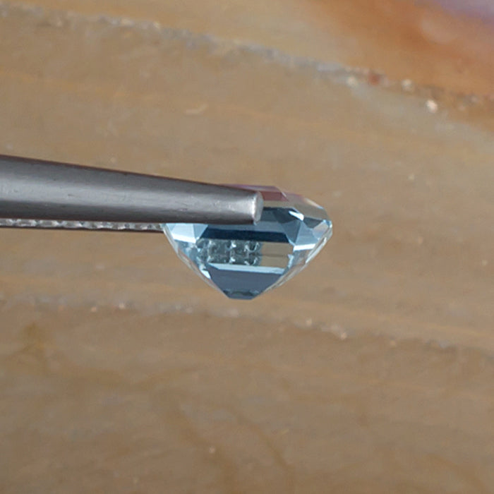 0.97ct Aquamarine Colored Gemstone Side View Natural Background 
