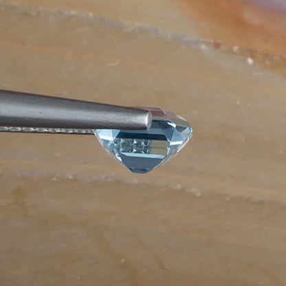 0.97ct Aquamarine Colored Gemstone Side View Natural Background 
