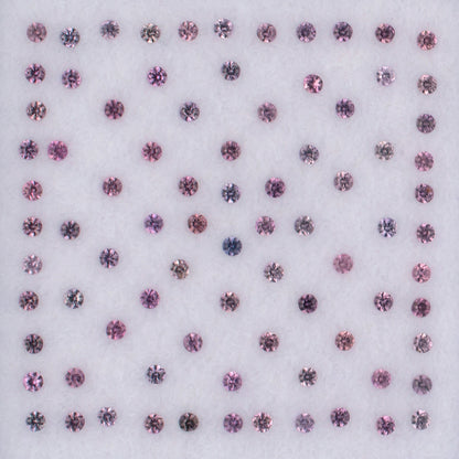 0.99twt Pink Sapphire Colored Gemstone Melee Parcel Top View White Background
