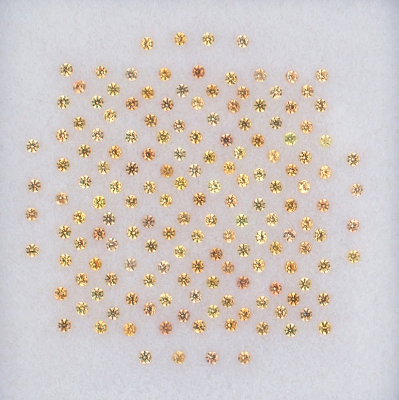 1.00mm Orange Sapphire Colored Gemstone Melee Parcel Top View White Background
