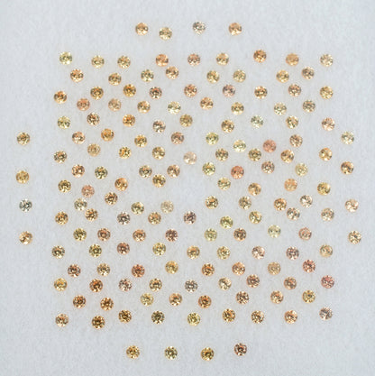 1.00mm Orange Sapphire Colored Gemstone Melee Parcel Top View White Background
