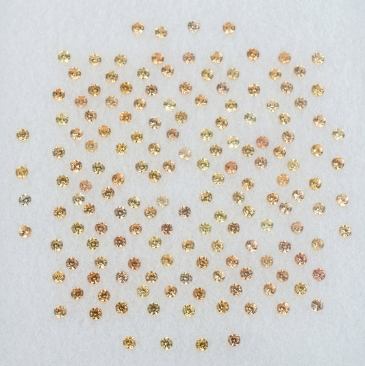 1.00mm Orange Sapphire Colored Gemstone Melee Parcel Top View White Background
