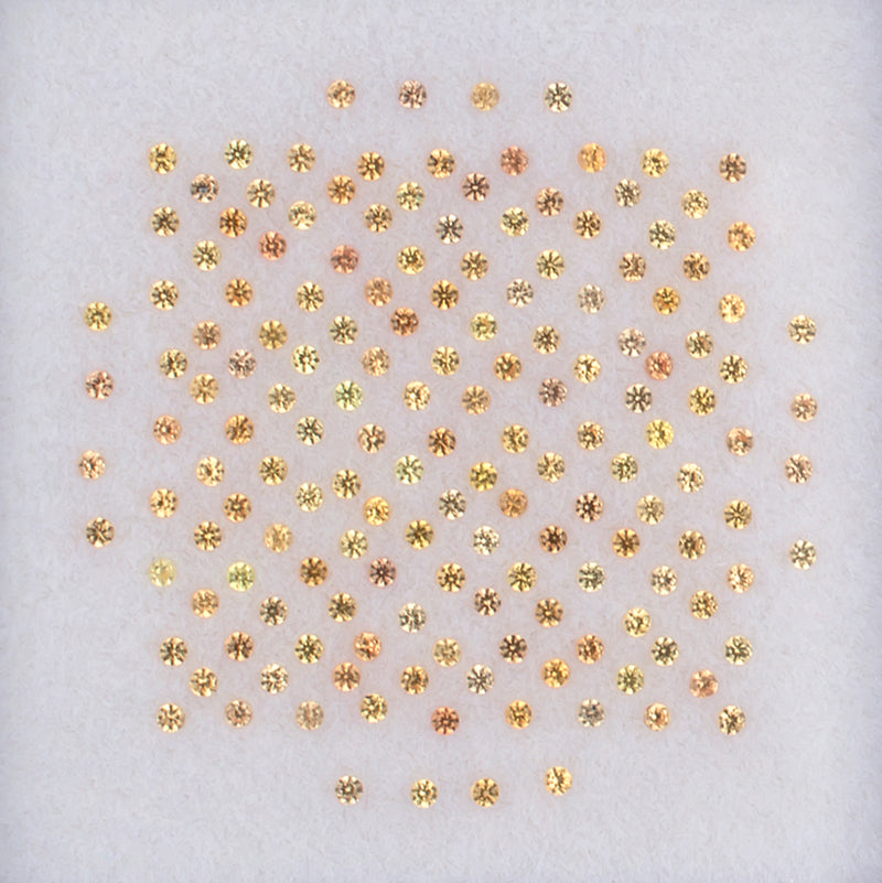 1.00mm Orange Sapphire Colored Gemstone Melee Parcel Top View White Background
