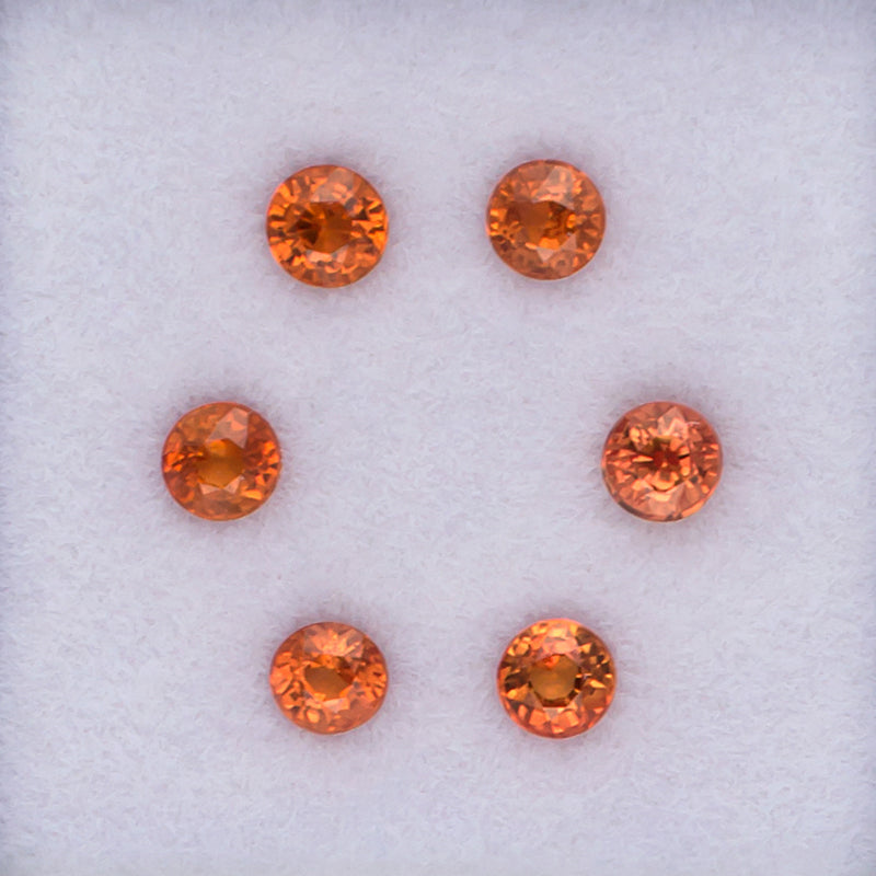 1.00twt Orange Sapphire Colored Gemstone Melee Parcel Top View White Background
