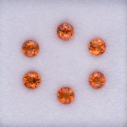 1.00twt Orange Sapphire Colored Gemstone Melee Parcel Top View White Background
