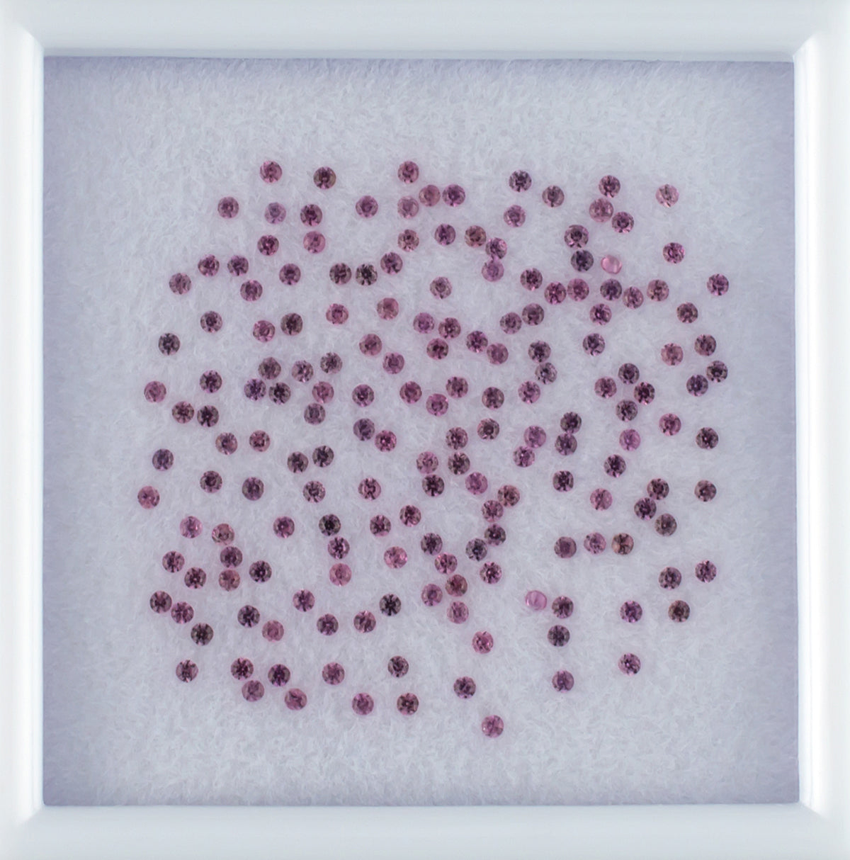 1.00twt Pink Sapphire Colored Gemstone Melee Parcel Top View White Background 
