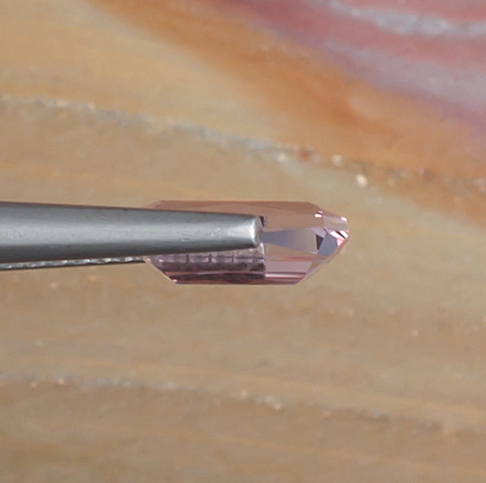 1.01ct Morganite Colored Gemstone Side View Natural Background 
