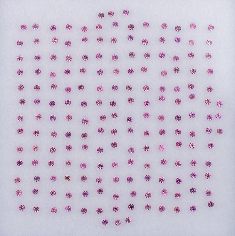 1.01twt Pink Sapphire Colored Gemstone Melee Parcel Top View White Background
