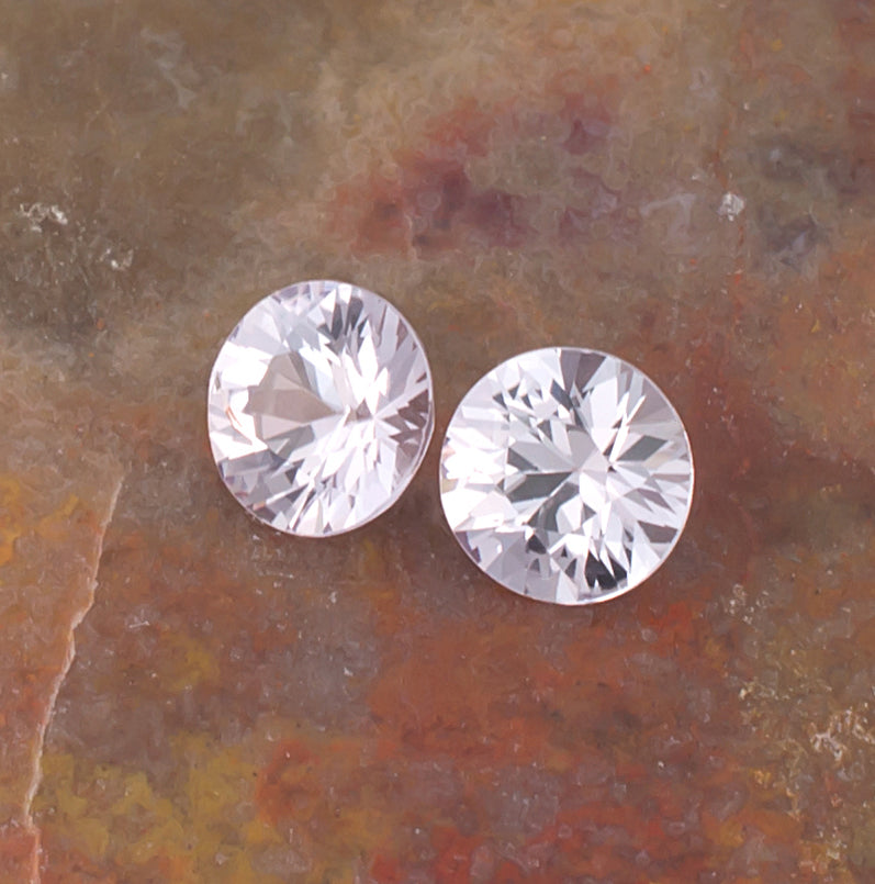 1.03twt Pink Sapphire Colored Gemstone Pair Crown View Natural Background
