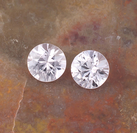 1.03twt Pink Sapphire Colored Gemstone Pair Crown View Natural Background
