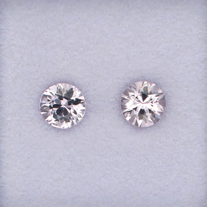 1.03twt Pink Sapphire Colored Gemstone Pair Top View White Background 
