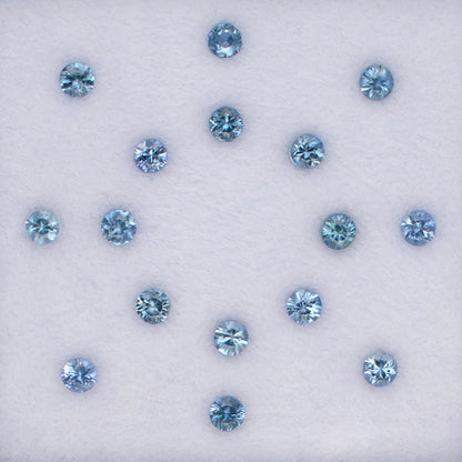 1.06twt Blue Sapphire Colored Gemstone Melee Parcel Top View White Background
