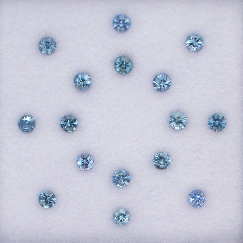 1.06twt Blue Sapphire Colored Gemstone Melee Parcel Top View White Background
