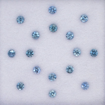 1.06twt Blue Sapphire Colored Gemstone Melee Parcel Top View White Background
