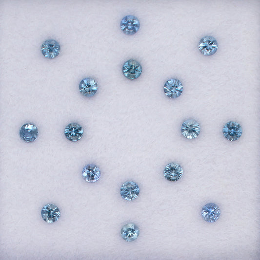 1.06twt Blue Sapphire Colored Gemstone Melee Parcel Top View White Background
