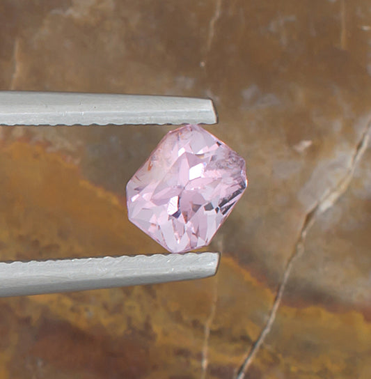 1.07ct Pink Spinel Colored Gemstone Top View Natural Background