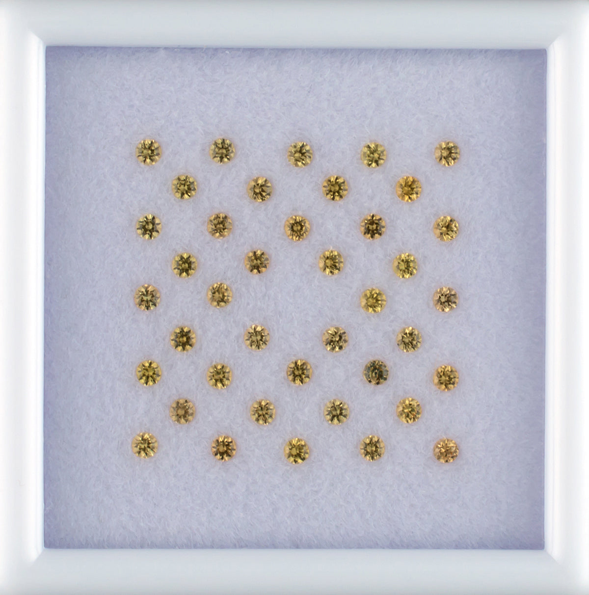 1.07twt Yellow Sapphire Colored Gemstone Melee Parcel Top View White Background

