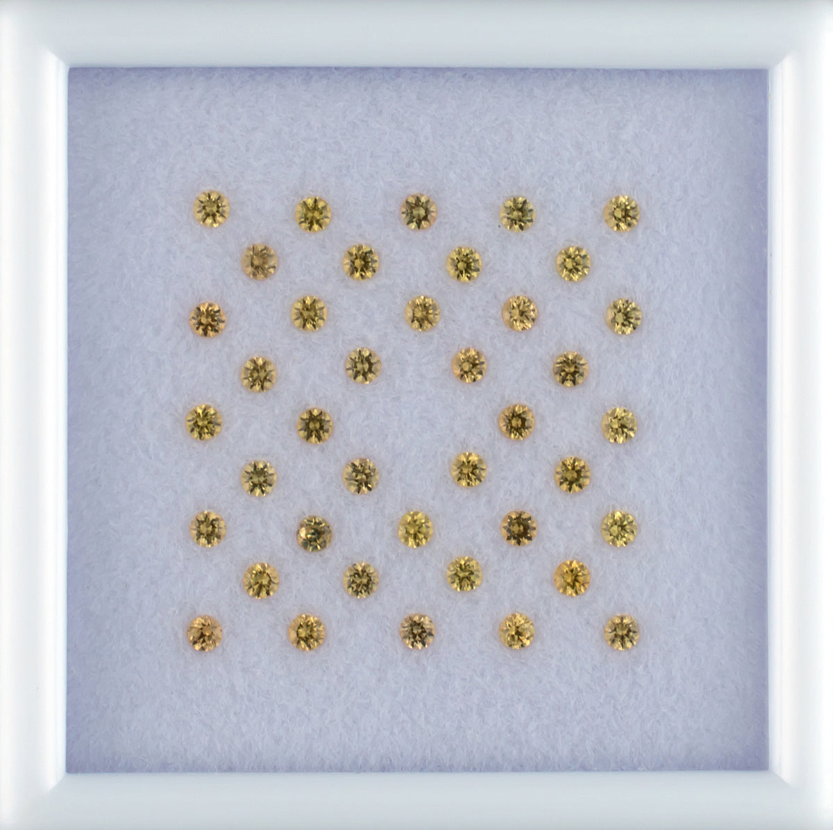 1.07twt Yellow Sapphire Colored Gemstone Melee Parcel Top View White Background
