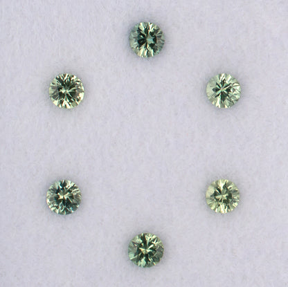 1.08twt Green Sapphire Colored Gemstone Melee Parcel Top View White Background
