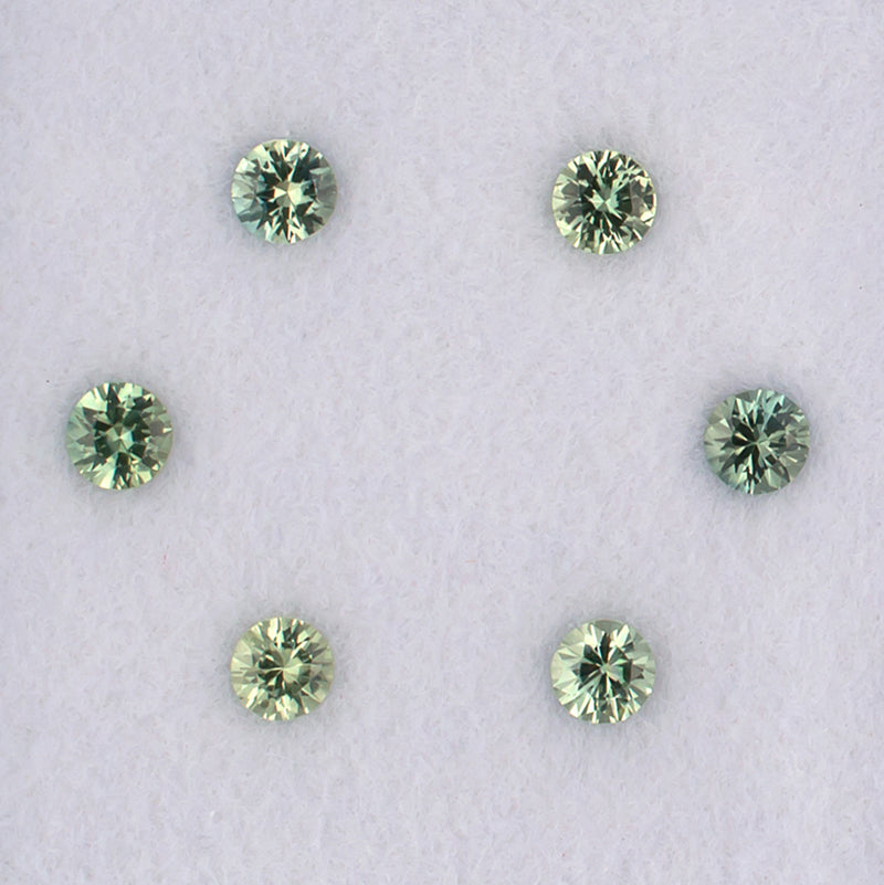 1.08twt Green Sapphire Colored Gemstone Melee Parcel Top View White Background
