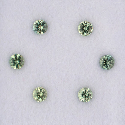 1.08twt Green Sapphire Colored Gemstone Melee Parcel Top View White Background
