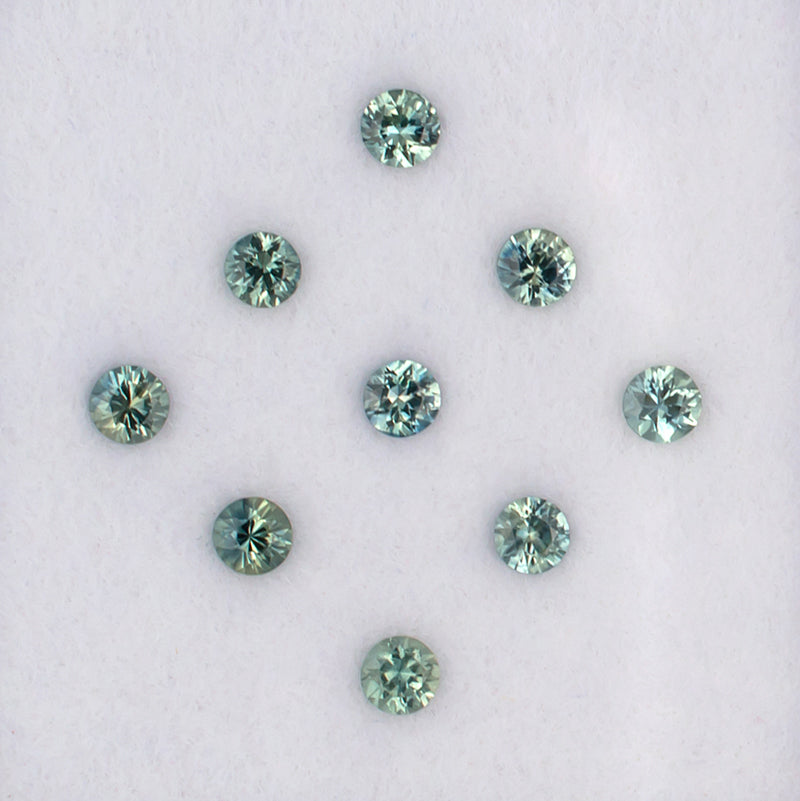 1.09twt Green Sapphire Colored Gemstone Melee Parcel Top View White Background
