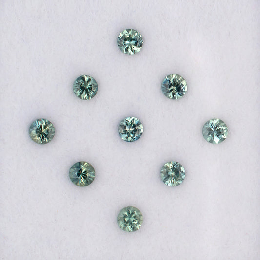 1.09twt Green Sapphire Colored Gemstone Melee Parcel Top View White Background
